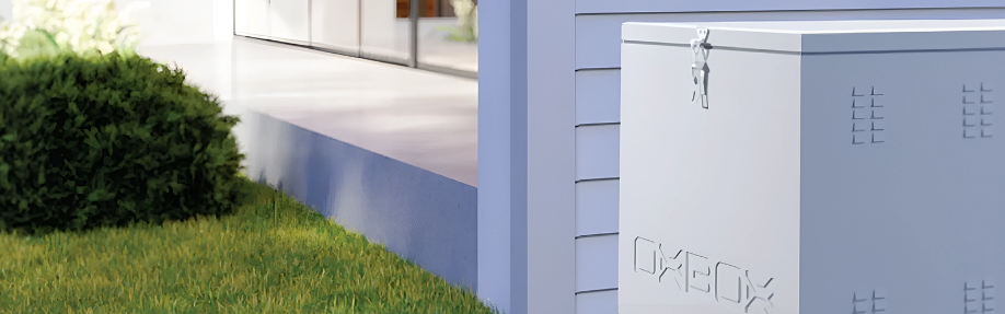 BAE Oxbox Energy Storage System sitting outside of a home